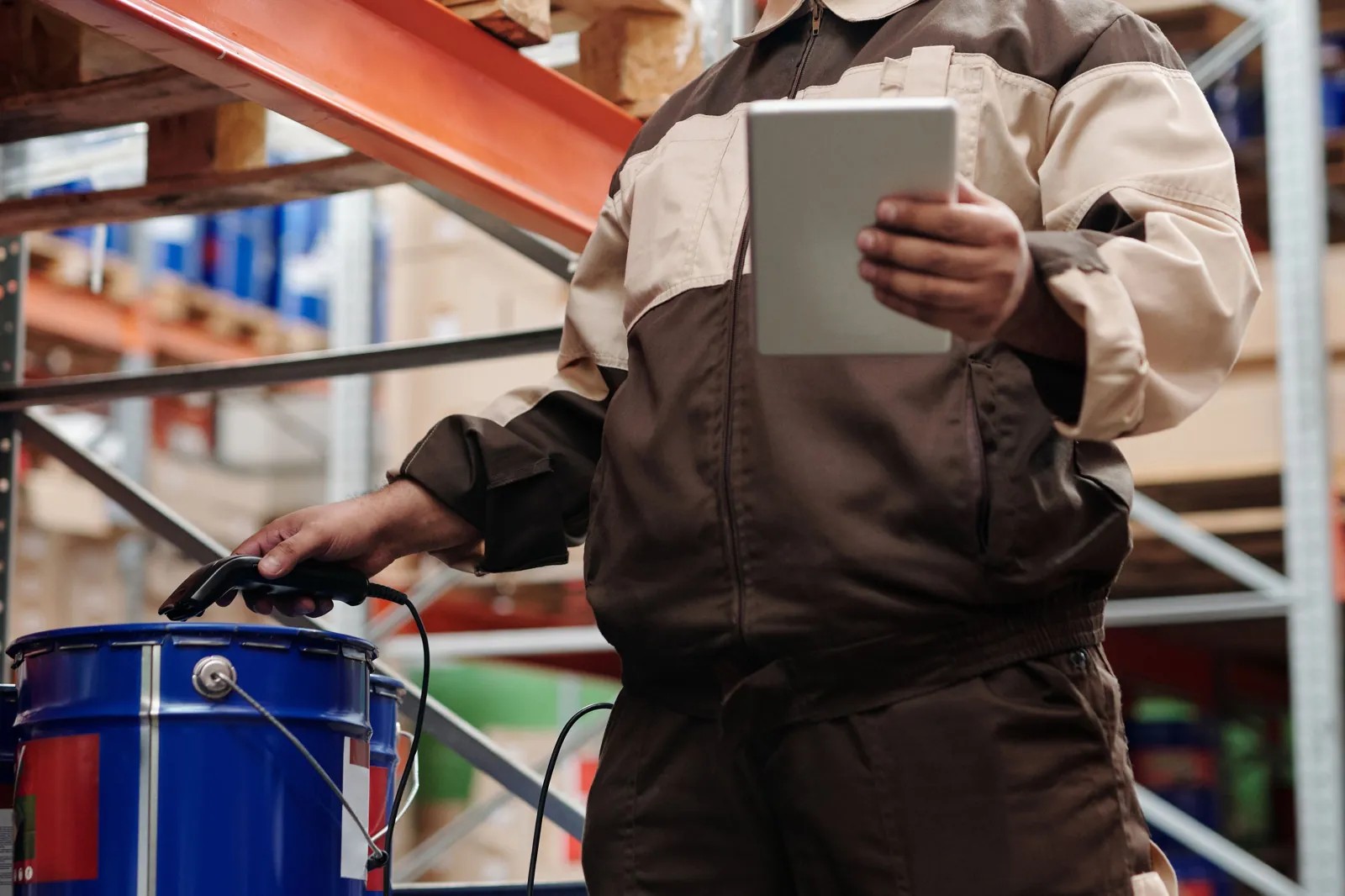Team member reviewing an AI agent's proposed action on a digital tablet